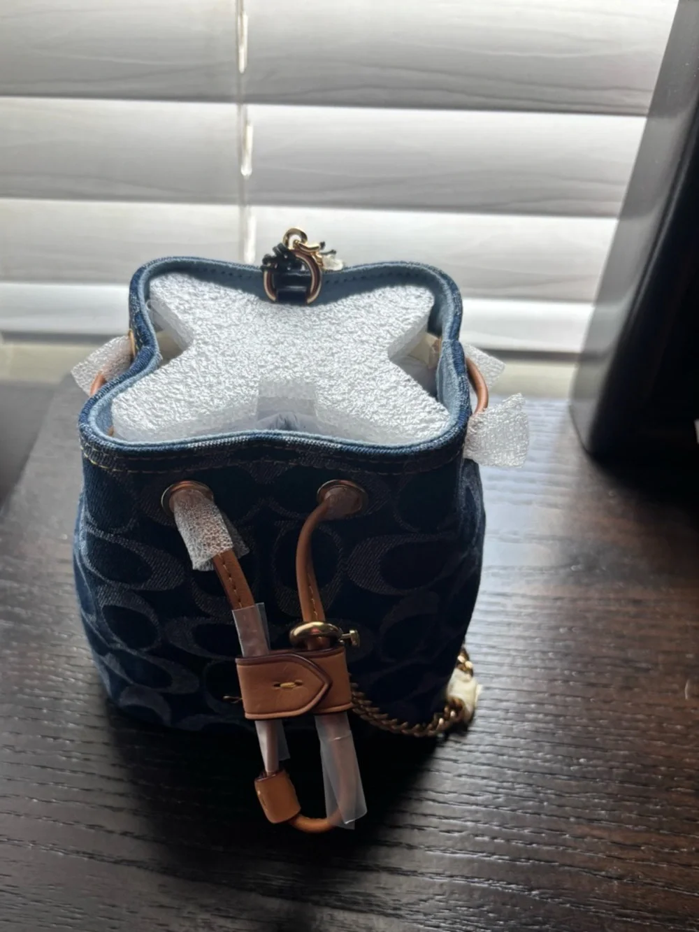 Coach Signature Denim Drawstring Wristlet
Navy Mini Bucket Bag with Gold Chain - Picture 9 of 10